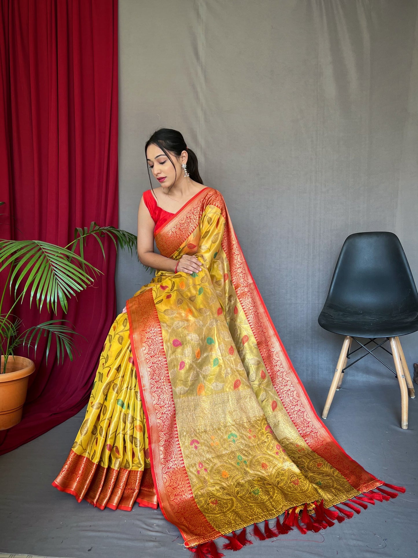 Mesmerizing Tissue Silk Yellow Color Saree