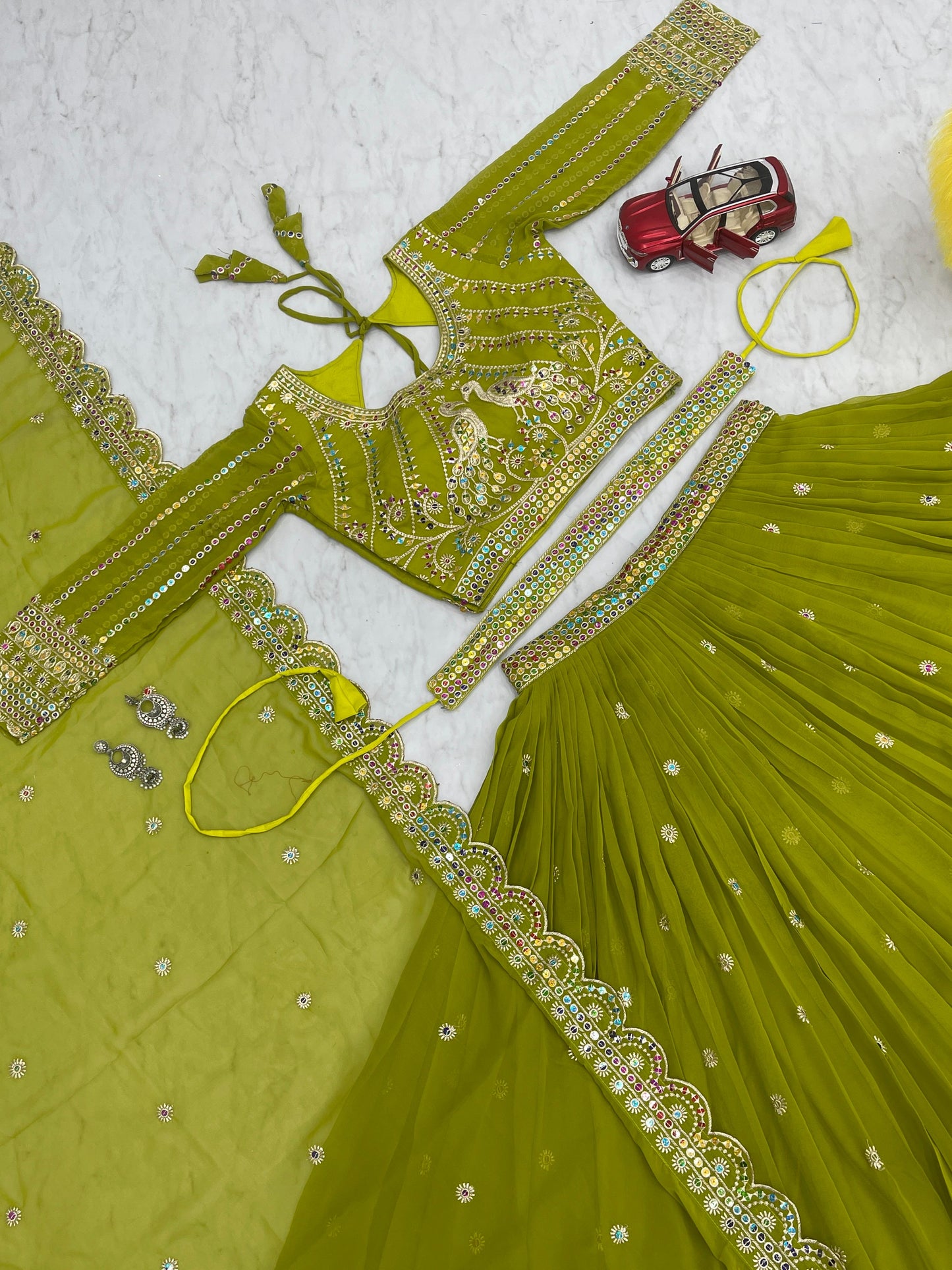 Captivating Mehndi Color Multi Sequence Work Lehenga Choli