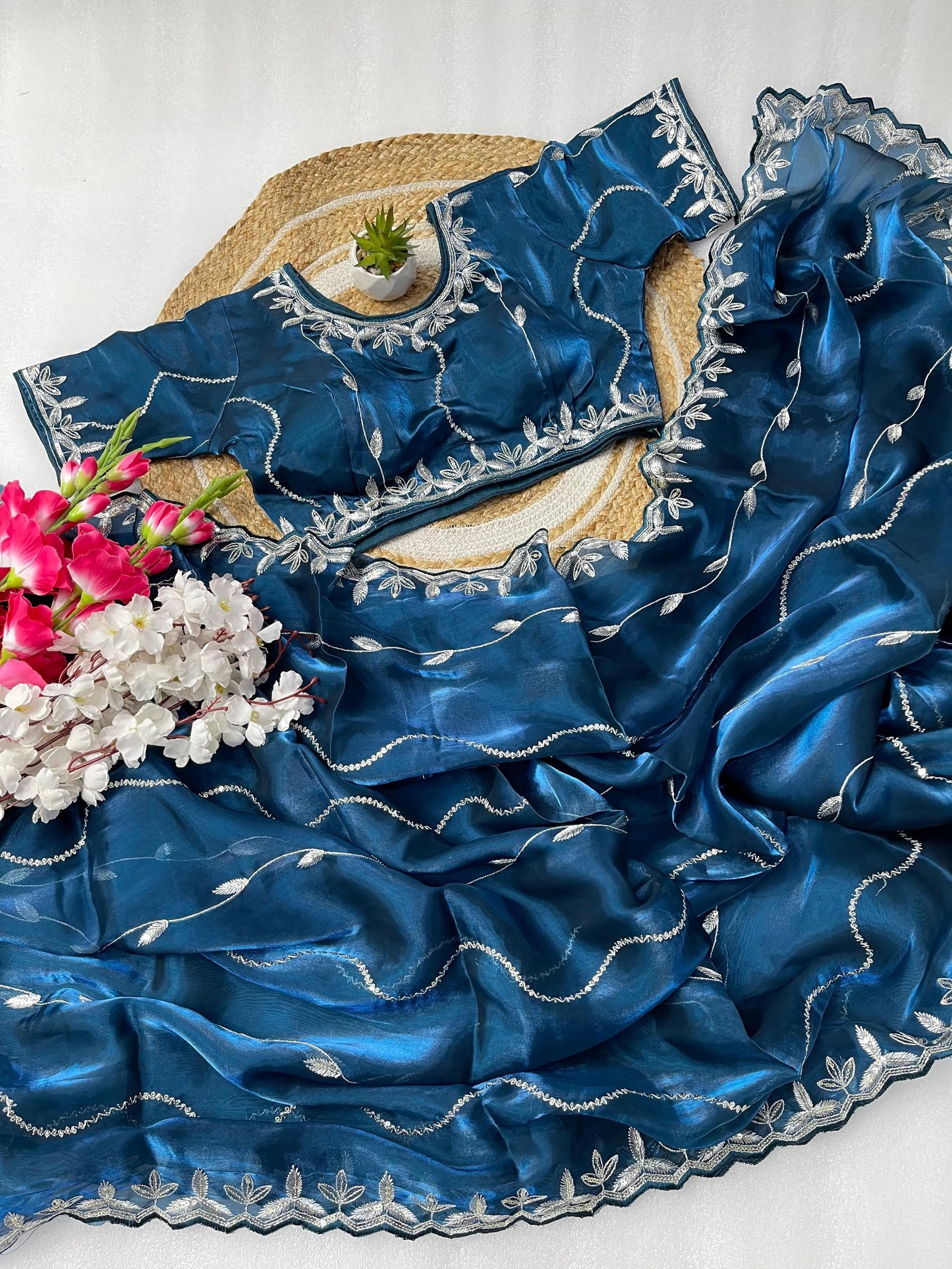 Presenting Sequence Work Border Blue Silk Saree